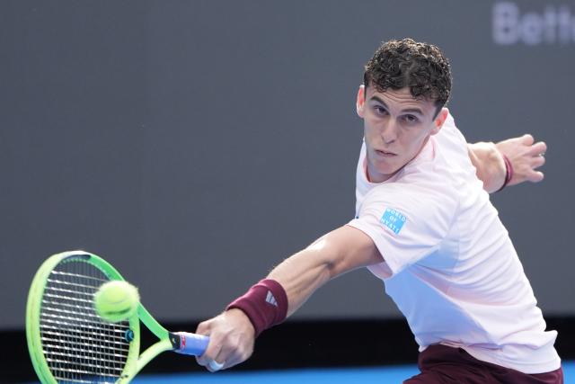 (260930) -- BEIJING, Sept. 30, 2026 (Xinhua) -- Juan Manuel Cerundolo of Argentina hits a return during the men's singles first round match against Bu Yunchaokete of China at 2026 China Open tennis tournament in Beijing, China, Sept. 30, 2026. (Xinhua/Xie Han)