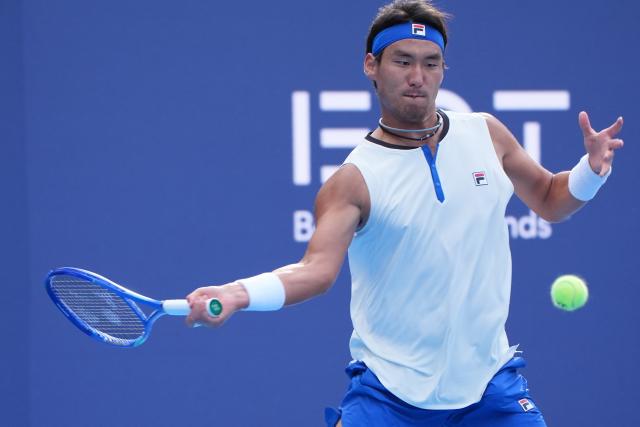 (260930) -- BEIJING, Sept. 30, 2026 (Xinhua) -- Bu Yunchaokete of China hits a return during the men's singles first round match against Juan Manuel Cerundolo of Argentina at 2026 China Open tennis tournament in Beijing, China, Sept. 30, 2026. (Xinhua/Xie Han)