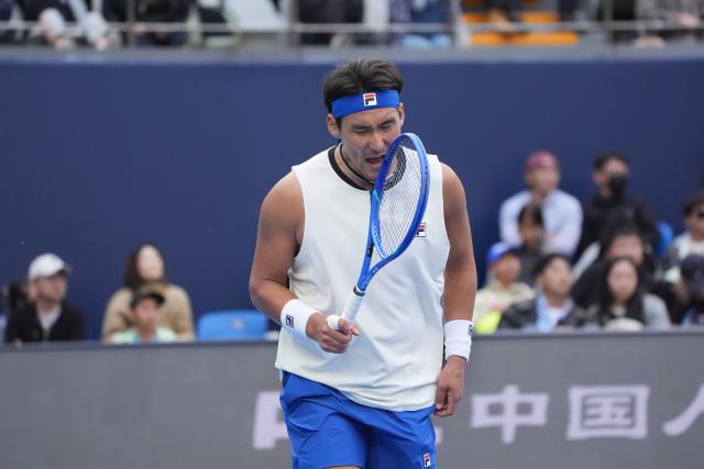 (260930) -- BEIJING, Sept. 30, 2026 (Xinhua) -- Bu Yunchaokete of China celebrates scoring during the men's singles first round match against Juan Manuel Cerundolo of Argentina at 2026 China Open tennis tournament in Beijing, China, Sept. 30, 2026. (Xinhua/Xie Han)