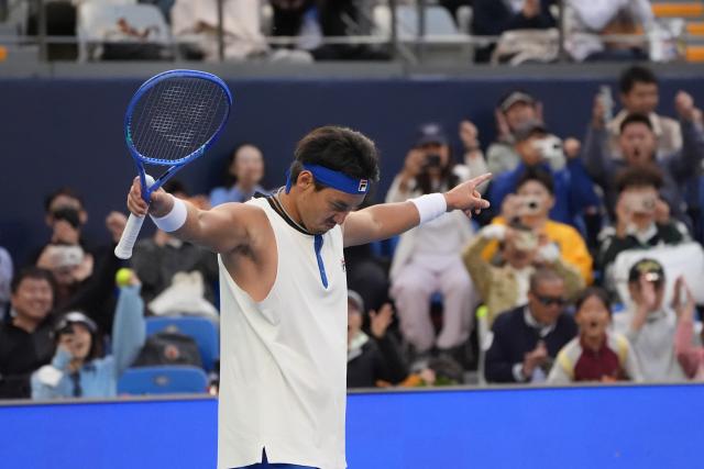 (260930) -- BEIJING, Sept. 30, 2026 (Xinhua) -- Bu Yunchaokete of China celebrates after winning the men's singles first round match against Juan Manuel Cerundolo of Argentina at 2026 China Open tennis tournament in Beijing, China, Sept. 30, 2026. (Xinhua/Xie Han)