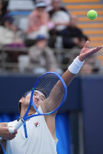 (260930) -- BEIJING, Sept. 30, 2026 (Xinhua) -- Bu Yunchaokete of China serves during the men's singles first round match against Juan Manuel Cerundolo of Argentina at 2026 China Open tennis tournament in Beijing, China, Sept. 30, 2026. (Xinhua/Xie Han)