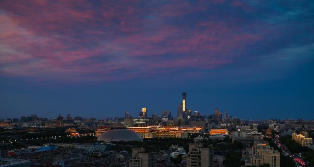(260930) -- BEIJING, Sept. 30, 2026 (Xinhua) -- This photo taken on Sept. 30, 2026 shows the city skyline at sunset in Beijing, capital of China. (Xinhua/Wang Jianhua)