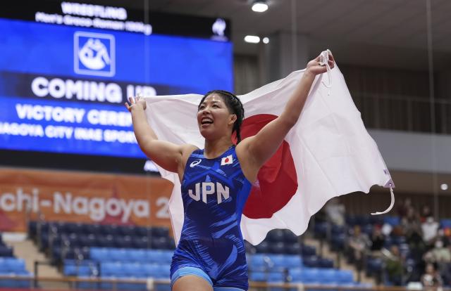 (260930) -- NAGOYA, Sept. 30, 2026 (Xinhua) -- Ishii Ami of Japan celebrates after defeating Pak Sol Gum of the Democratic People's Republic of Korea (DPRK) during the Women's 68kg final match of Wrestling at the 20th Asian Games Aichi-Nagoya 2026 in Nagoya, Japan, Sept. 30, 2026. (Xinhua/Li Bo)