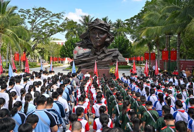 (260930) -- BEIJING, Sept. 30, 2026 (Xinhua) -- Students take part in a martyr commemorative event in Qionghai City, south China's Hainan Province, Sept. 30, 2026. Commemorative events were held across China to mark Martyrs' Day in recent days. Observed on Sept. 30, one day before National Day, the day commemorates those who gave their lives for national independence and prosperity. (Xinhua/Guo Cheng)