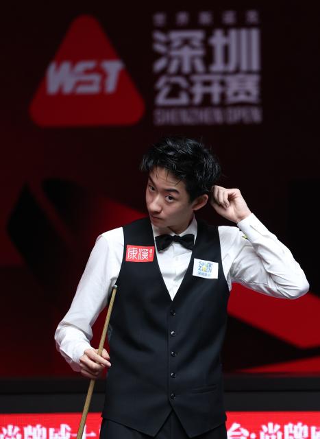 (260930) -- SHENZHEN, Sept. 30, 2026 (Xinhua) -- Wu Yize reacts during the round 3 match between Wu Yize and Xu Si of China at World Snooker Tour Shenzhen Open 2026 in Shenzhen, south China's Guangdong Province, Sept. 30, 2026. (Xinhua/Mao Siqian)