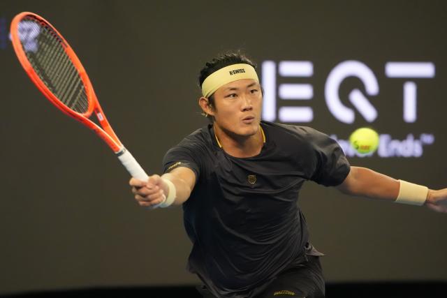 (260930) -- BEIJING, Sept. 30, 2026 (Xinhua) -- Zhang Zhizhen of China hits a return during the men's singles first round match against Arthur Gea of France at 2026 China Open tennis tournament in Beijing, China, Sept. 30, 2026. (Xinhua/Xie Han)