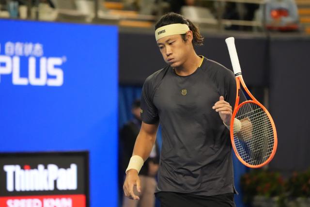(260930) -- BEIJING, Sept. 30, 2026 (Xinhua) -- Zhang Zhizhen of China reacts during the men's singles first round match against Arthur Gea of France at 2026 China Open tennis tournament in Beijing, China, Sept. 30, 2026. (Xinhua/Xie Han)