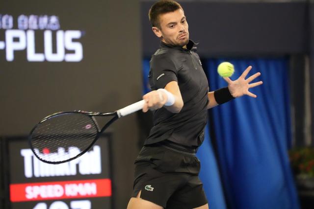(260930) -- BEIJING, Sept. 30, 2026 (Xinhua) -- Arthur Gea of France hits a return during the men's singles first round match against Zhang Zhizhen of China at 2026 China Open tennis tournament in Beijing, China, Sept. 30, 2026. (Xinhua/Xie Han)