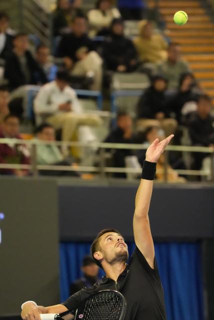 (260930) -- BEIJING, Sept. 30, 2026 (Xinhua) -- Arthur Gea of France serves during the men's singles first round match against Zhang Zhizhen of China at 2026 China Open tennis tournament in Beijing, China, Sept. 30, 2026. (Xinhua/Xie Han)