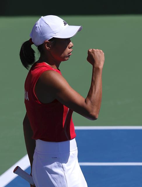 (261001) -- NAGOYA, Oct. 1, 2026 (Xinhua) -- Zhang Shuai of China celebrates during the women's singles semifinals of tennis against Yuliya Putintseva of Kazakhstan at the 20th Asian Games Aichi-Nagoya 2026 in Nagoya, Japan, Oct. 1, 2026. (Xinhua/Li Bo)