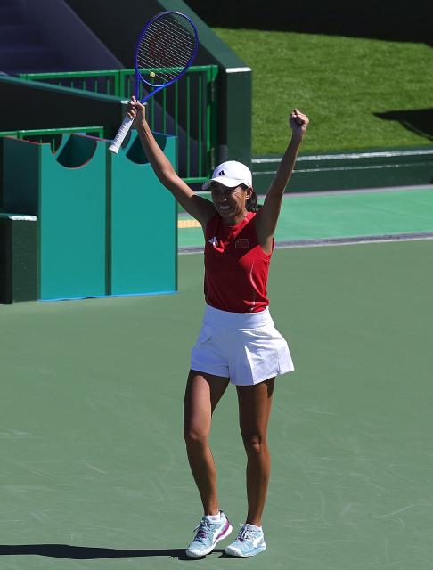 (261001) -- NAGOYA, Oct. 1, 2026 (Xinhua) -- Zhang Shuai of China celebrates after the women's singles semifinals of tennis against Yuliya Putintseva of Kazakhstan at the 20th Asian Games Aichi-Nagoya 2026 in Nagoya, Japan, Oct. 1, 2026. (Xinhua/Li Bo)