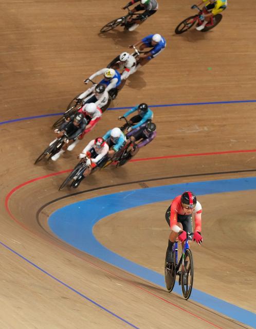(261001) -- IZU, Oct. 1, 2026 (Xinhua) -- Wu Junjie (front) of China competes during the men's omnium elimination race of cycling track at the 20th Asian Games Aichi-Nagoya 2026 in Izu of Shizuoka Prefecture, Japan, Oct. 1, 2026. (Xinhua/Zhou Mi)