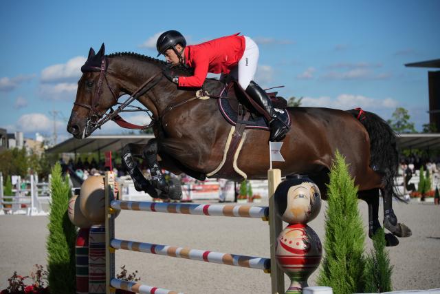 (261001) -- TOKYO, Oct. 1, 2026 (Xinhua) -- Sato Eiken of team Japan competes during the jumping team final of equestrian at the 20th Asian Games Aichi-Nagoya 2026 in Tokyo, Japan, Oct. 1, 2026. (Photo by Wang Shen/Xinhua)