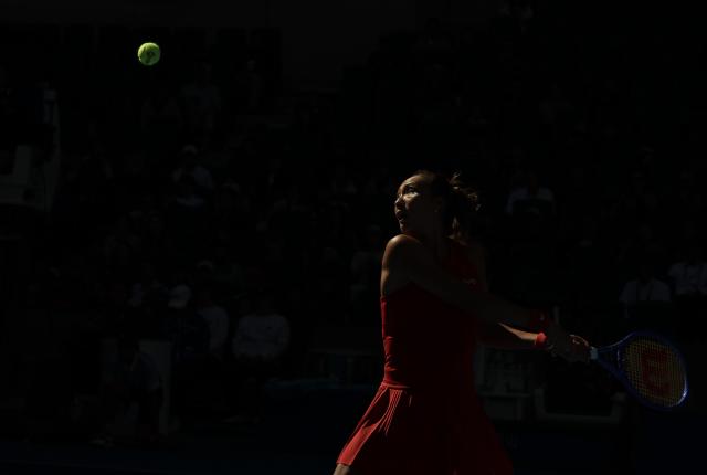 (261001) -- BEIJING, Oct. 1, 2026 (Xinhua) -- Zheng Qinwen competes during the women's singles first round match between Zheng Qinwen of China and Shi Han of China at 2026 China Open tennis tournament in Beijing, China, Oct. 1, 2026. (Xinhua/Bai Xuefei)