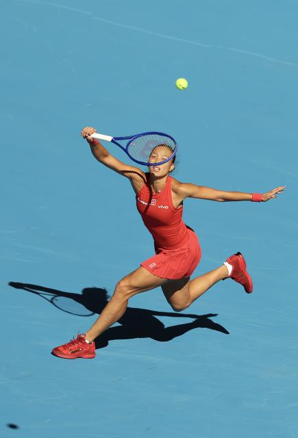 (261001) -- BEIJING, Oct. 1, 2026 (Xinhua) -- Zheng Qinwen competes during the women's singles first round match between Zheng Qinwen of China and Shi Han of China at 2026 China Open tennis tournament in Beijing, China, Oct. 1, 2026. (Xinhua/Bai Xuefei)