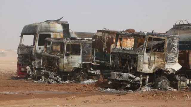 (261001) -- KABUL, Oct. 1, 2026 (Xinhua) -- This photo taken on Oct. 1, 2026 shows the wreckage of tankers after a fire at the Islam Qala border crossing in Herat province, Afghanistan. At least 18 fuel tankers were fully engulfed in flames and three others partially damaged when a major fire erupted at the Islam Qala border crossing in western Afghanistan's Herat province on Wednesday evening, the National Disaster Management Authority announced on Thursday. (Photo by Mashal/Xinhua)