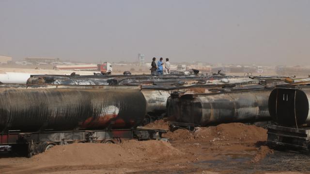 (261001) -- KABUL, Oct. 1, 2026 (Xinhua) -- This photo taken on Oct. 1, 2026 shows the site of a fire at the Islam Qala border crossing in Herat province, Afghanistan. At least 18 fuel tankers were fully engulfed in flames and three others partially damaged when a major fire erupted at the Islam Qala border crossing in western Afghanistan's Herat province on Wednesday evening, the National Disaster Management Authority announced on Thursday. (Photo by Mashal/Xinhua)