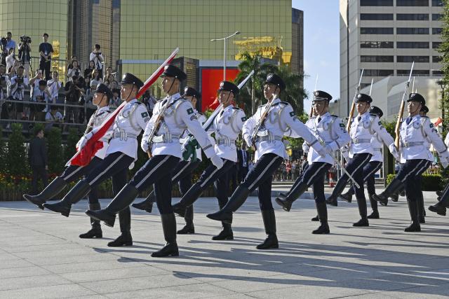 (261001) -- MACAO, Oct. 1, 2026 (Xinhua) -- A flag-raising ceremony marking the 77th anniversary of the founding of the People's Republic of China is held at the Golden Lotus Square in Macao, south China, Oct. 1, 2026. (Xinhua)