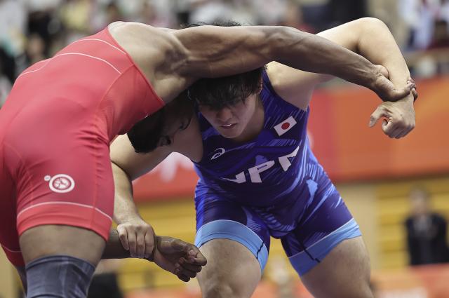 (261001) -- NAGOYA, Oct. 1, 2026 (Xinhua) -- Nakazato Yuri (R) of Japan competes with Nitesh of India during the men's Greco-Roman 97kg final match of Wrestling at the 20th Asian Games Aichi-Nagoya 2026 in Nagoya, Japan, Oct. 1, 2026. (Xinhua/Long Lei)