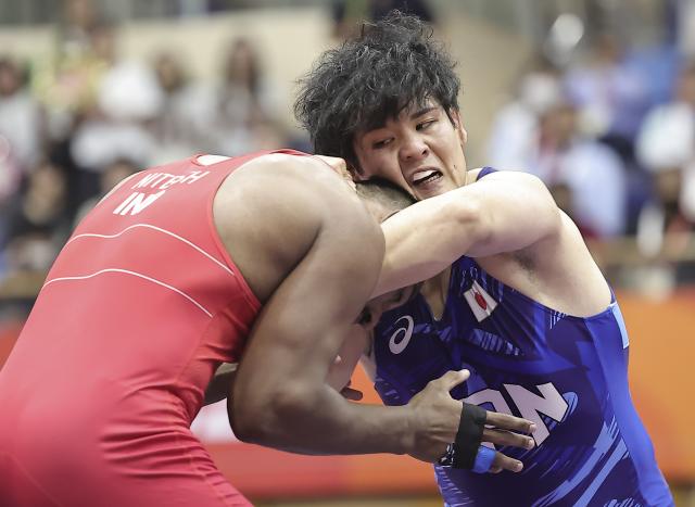 (261001) -- NAGOYA, Oct. 1, 2026 (Xinhua) -- Nakazato Yuri (R) of Japan competes with Nitesh of India during the men's Greco-Roman 97kg final match of Wrestling at the 20th Asian Games Aichi-Nagoya 2026 in Nagoya, Japan, Oct. 1, 2026. (Xinhua/Long Lei)
