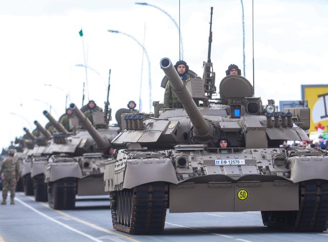(261001) -- NICOSIA, Oct. 1, 2026 (Xinhua) -- Tanks of the Cypriot National Guard move in formation during a military parade celebrating the 66th anniversary of independence of Cyprus in Nicosia, Cyprus, Oct. 1, 2026. (Photo by George Christophorou/Xinhua)