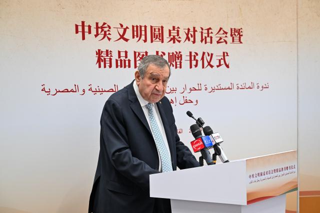 (261001) -- CAIRO, Oct. 1, 2026 (Xinhua) -- Essam Sharaf, former Egyptian prime minister, addresses a China-Egypt civilization roundtable dialogue and a book donation ceremony in Giza, Egypt, Sept. 30, 2026. TO GO WITH "China-Egypt civilization dialogue, book donation ceremony held in Egypt" (Xinhua/Xin Mengchen)