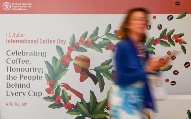 (261001) -- ROME, Oct. 1, 2026 (Xinhua) -- A woman walks past the official poster of the International Coffee Day 2026 in Rome, Italy, Oct. 1, 2026. The Food and Agriculture Organization of the United Nations (FAO) marked the first observance of International Coffee Day in Rome on Thursday.
International Coffee Day was officially designated by the United Nations General Assembly on March 10, 2026. (Xinhua/Wang Kaiyan)