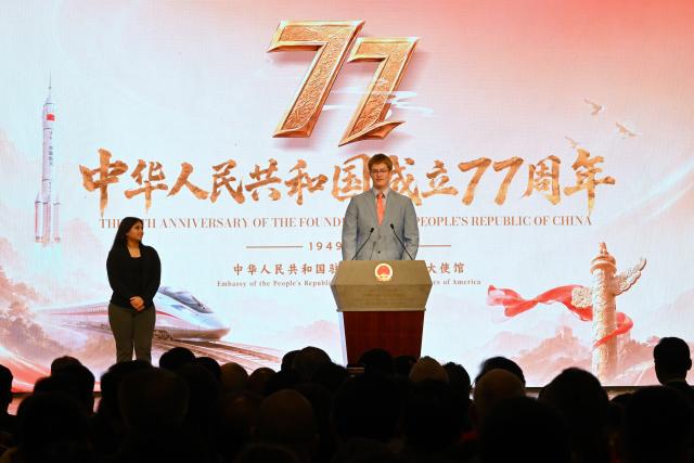 (261001) -- WASHINGTON, Oct. 1, 2026 (Xinhua) -- Ryan Corkery, who took part in the "50,000 in Five Years" initiative, delivers a speech at the Chinese Embassy in the United States in Washington, D.C., Sept. 30, 2026. The Chinese Embassy in the United States on Wednesday hosted a reception to mark the 77th anniversary of the founding of the People's Republic of China (PRC), drawing more than 800 guests to the event. (Xinhua/Li Rui)