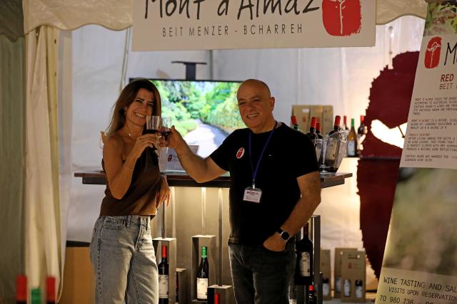 (261001) -- BEIRUT, Oct. 1, 2026 (Xinhua) -- Visitors taste wine at Vinifest, a wine festival, in Beirut, Lebanon, Oct. 1, 2026. (Xinhua/Bilal Jawich)