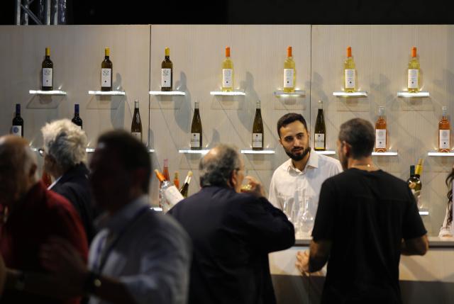 (261001) -- BEIRUT, Oct. 1, 2026 (Xinhua) -- Visitors taste wine at Vinifest, a wine festival, in Beirut, Lebanon, Oct. 1, 2026. (Xinhua/Bilal Jawich)