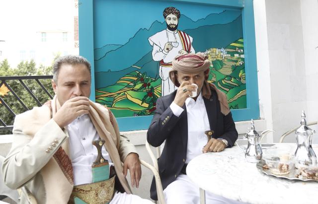 (261001) -- SANAA, Oct. 1, 2026 (Xinhua) -- Guests taste coffee during an event to mark the International Coffee Day at Haraz Coffee Center in Sanaa, Yemen, Oct. 1, 2026. An event was held in Yemen's capital Sanaa on Thursday to mark International Coffee Day. (Photo by Mohammed Mohammed/Xinhua)