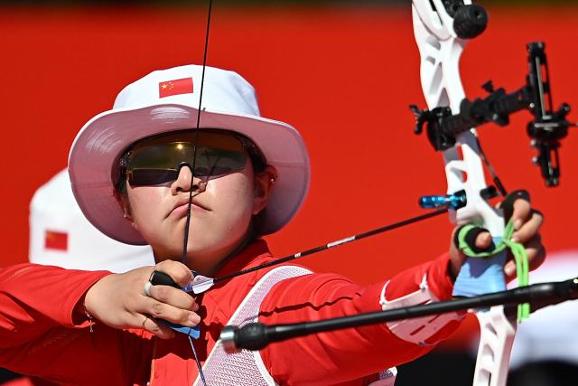 (261002) -- OKAZAKI, Oct. 2, 2026 (Xinhua) -- Zhu Jingyi of team China competes during the recurve women's team bronze medal match of archery against team Indonesia at the 20th Asian Games Aichi-Nagoya 2026 in Okazaki of Aichi Prefecture, Japan, Oct. 2, 2026. (Xinhua/Yu Yang)