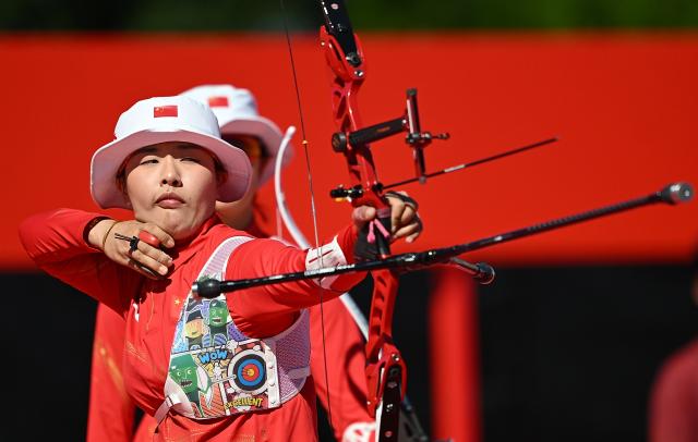 (261002) -- OKAZAKI, Oct. 2, 2026 (Xinhua) -- Huang Yuwei of team China competes during the recurve women's team bronze medal match of archery against team Indonesia at the 20th Asian Games Aichi-Nagoya 2026 in Okazaki of Aichi Prefecture, Japan, Oct. 2, 2026. (Xinhua/Yu Yang)