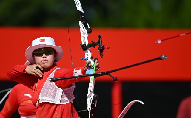 (261002) -- OKAZAKI, Oct. 2, 2026 (Xinhua) -- Zhu Jingyi of team China competes during the recurve women's team bronze medal match of archery against team Indonesia at the 20th Asian Games Aichi-Nagoya 2026 in Okazaki of Aichi Prefecture, Japan, Oct. 2, 2026. (Xinhua/Yu Yang)