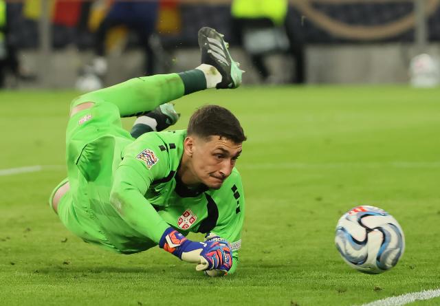 (261002) -- MUNICH, Oct. 2, 2026 (Xinhua) -- Djordje Petrovic, goalkeeper of Serbia, makes a save during the UEFA Nations League 2026/27 League A Group A2 match between Germany and Serbia in Munich, Germany, Oct. 1, 2026. (Photo by Philippe Ruiz/Xinhua)