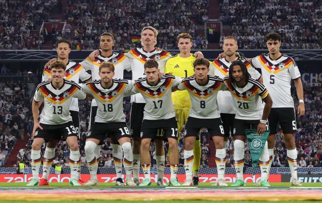 (261002) -- MUNICH, Oct. 2, 2026 (Xinhua) -- Starting players of Germany line up before the UEFA Nations League 2026/27 League A Group A2 match between Germany and Serbia in Munich, Germany, Oct. 1, 2026. (Photo by Philippe Ruiz/Xinhua)