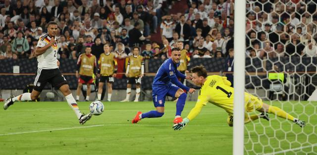 (261002) -- MUNICH, Oct. 2, 2026 (Xinhua) -- Filip Kostic (C) of Serbia competes during the UEFA Nations League 2026/27 League A Group A2 match between Germany and Serbia in Munich, Germany, Oct. 1, 2026. (Photo by Philippe Ruiz/Xinhua)