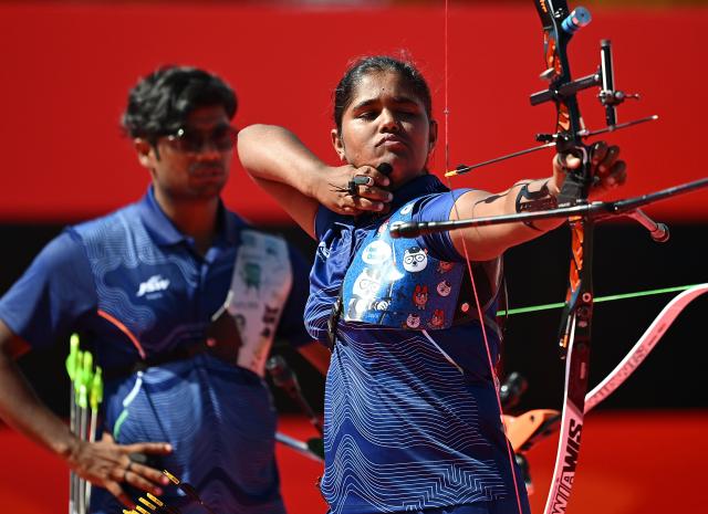 (261002) -- OKAZAKI, Oct. 2, 2026 (Xinhua) -- Kumkum Anil Mohod (R) of team India competes during the recurve mixed team gold medal match of archery against team China at the 20th Asian Games Aichi-Nagoya 2026 in Okazaki of Aichi Prefecture, Japan, Oct. 2, 2026. (Xinhua/Yu Yang)