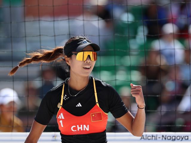 (261002) -- HEKINAN, Oct. 2, 2026 (Xinhua) -- Cao Shuting of China celebrates during the Women's Beach Volleyball Bronze Medal Match between Cao Shuting/Dong Jie of China and Khylem Harl Progella/Sofiah Shanine Pagara of the Philippines at the 20th Asian Games Aichi-Nagoya 2026 in Hekinan of Aichi Prefecture, Japan, Oct. 2, 2026. (Xinhua/Luo Yuan)