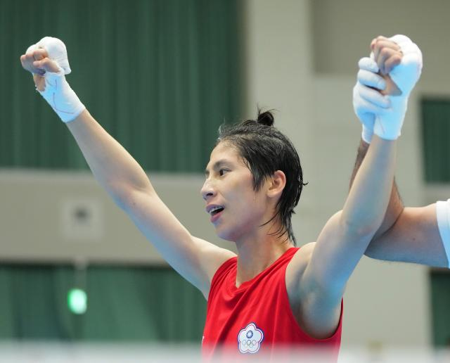 (261002) -- NISHIO, Oct. 2, 2026 (Xinhua) -- Lin Yu-ting of Chinese Taipei celebrates after winning the women's 60kg final bout of boxing against Yang Chengyu of China at the 20th Asian Games Aichi-Nagoya 2026 in Nishio of Aichi Prefecture, Japan, Oct. 2, 2026. (Xinhua/Chen Zeguo)