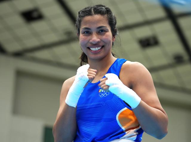(261002) -- NISHIO, Oct. 2, 2026 (Xinhua) -- Lovlina Borgohain of India poses for photos after the women's 75kg final bout of boxing against Lovlina Borgohain of India at the 20th Asian Games Aichi-Nagoya 2026 in Nishio of Aichi Prefecture, Japan, Oct. 2, 2026. (Xinhua/Chen Zeguo)