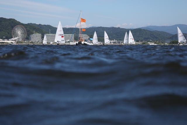 (261002) --  GAMAGORI, Oct. 2, 2026 (Xinhua) -- Athletes compete during the Men's Dinghy Final of Sailing at the 20th Asian Games Aichi-Nagoya 2026 in Gamagori of Aichi Prefecture, Japan, Oct. 2, 2026. (Xinhua/Deng Hua)
