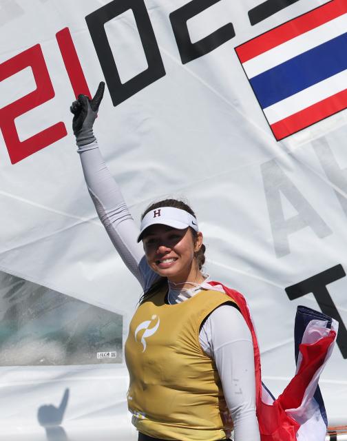 (261002) --  GAMAGORI, Oct. 2, 2026 (Xinhua) -- Sophia Montgomery of Thailand celebrates after the Women's Dinghy Final of Sailing at the 20th Asian Games Aichi-Nagoya 2026 in Gamagori of Aichi Prefecture, Japan, Oct. 2, 2026. (Xinhua/Deng Hua)