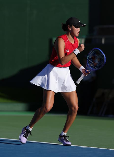 (261002) -- NAGOYA, Oct. 2, 2026 (Xinhua) -- Wang Xiyu of China celebrates during the women's singles Gold Medal Match of tennis between Wang Xiyu of China and Zhang Shuai of China at the 20th Asian Games Aichi-Nagoya 2026 in Nagoya, Japan, Oct. 2, 2026. (Xinhua/Li Bo)