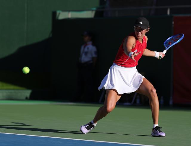 (261002) -- NAGOYA, Oct. 2, 2026 (Xinhua) -- Wang Xiyu hits a return during the women's singles Gold Medal Match of tennis between Wang Xiyu of China and Zhang Shuai of China at the 20th Asian Games Aichi-Nagoya 2026 in Nagoya, Japan, Oct. 2, 2026. (Xinhua/Li Bo)