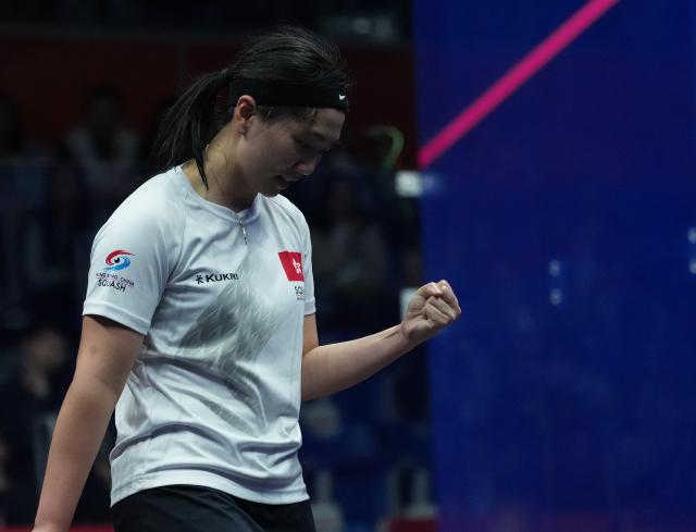 (261002) -- NAGOYA, Oct. 2, 2026 (Xinhua) -- Chan Sin Yuk of team China's Hong Kong celebrates after winning the match against Sivasangari Subramaniam of team Malaysia during the Women's Team Gold Medal Match of Squash at the 20th Asian Games Aichi-Nagoya 2026 in Nagoya, Japan, Oct. 2, 2026. (Xinhua/Jia Yuchen)