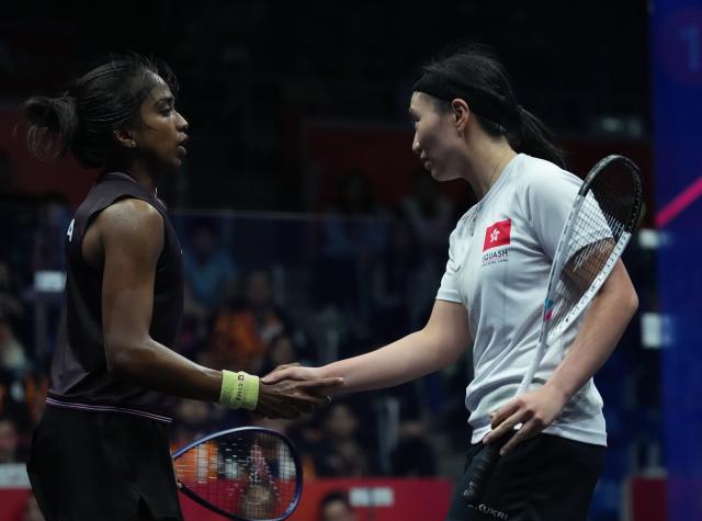 (261002) -- NAGOYA, Oct. 2, 2026 (Xinhua) -- Sivasangari Subramaniam (L) of team Malaysia shakes hands with Chan Sin Yuk of team China's Hong Kong during the Women's Team Gold Medal Match of Squash at the 20th Asian Games Aichi-Nagoya 2026 in Nagoya, Japan, Oct. 2, 2026. (Xinhua/Jia Yuchen)