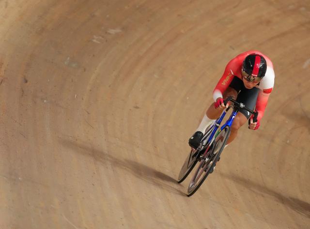 (261002) -- IZU, Oct. 2, 2026 (Xinhua) -- A cyclist of China competes during the men's madison final of cycling track at the 20th Asian Games Aichi-Nagoya 2026 in Izu of Shizuoka Prefecture, Japan, Oct. 2, 2026. (Xinhua/Zhou Mi)