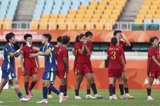 (261002) -- FUKUROI, Oct. 2, 2026 (Xinhua) -- Players of China react after the women's 3rd place match of football between China and South Korea at 20th Asian Games Aichi-Nagoya 2026 in Fukuroi of Shizuoka Prefecture, Japan, Oct. 2, 2026. (Xinhua/Jia Haocheng)