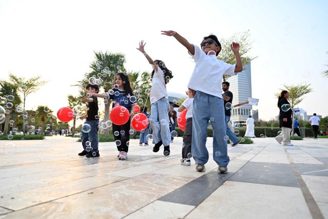 (261002) -- KUWAIT CITY, Oct. 2, 2026 (Xinhua) -- Children have fun at Al Shaheed Park in Kuwait City, Kuwait, on Oct. 1, 2026. The third phase of Al Shaheed Park opened to the public in Kuwait City on Thursday. (Photo by Asad/Xinhua)